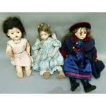 Three modern pot dolls together with a 1950s hard plastic doll