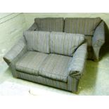 Two navy blue and brown striped two seater sofas