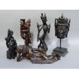 Five items of hardwood, plaster and faux wood carvings in Chinese and Tibetan style, various