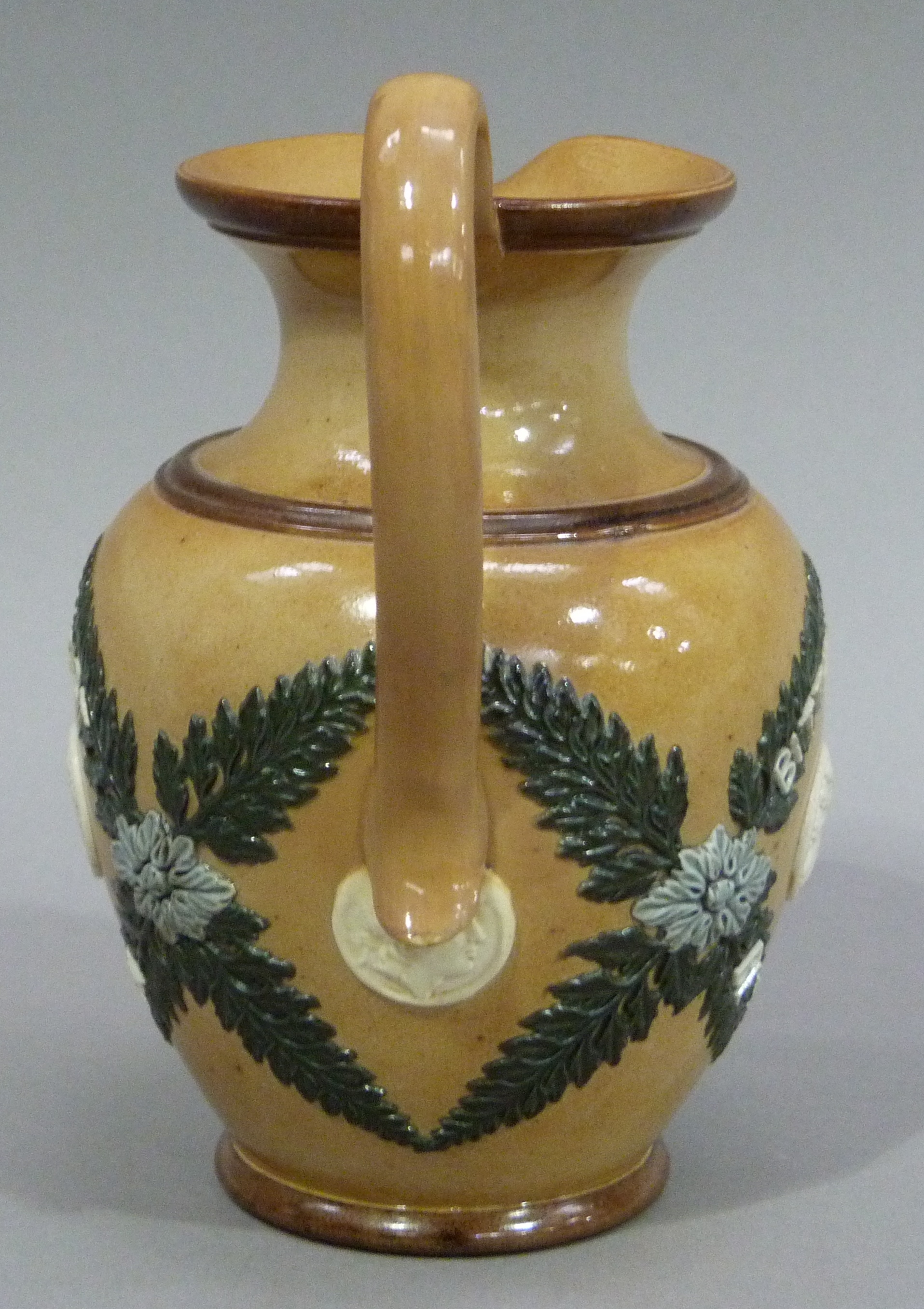 A Doulton Lambeth stoneware jug, 'Bitter must be the Cup' 17cm high - Image 2 of 5