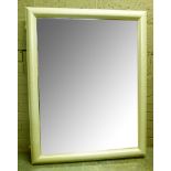 A white framed rectangular wall mirror, bevelled glass, 117cm x 89cm