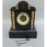 A Victorian black slate mantel clock inlaid with pink marble panels, the cream enamel chapter ring