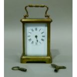 A brass carriage clock having an enamelled dial with black Roman numerals, the back plate stamped