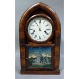 A Waterbury Clock Co. mantel clock in a rosewood veneered lancet case, 48cm high