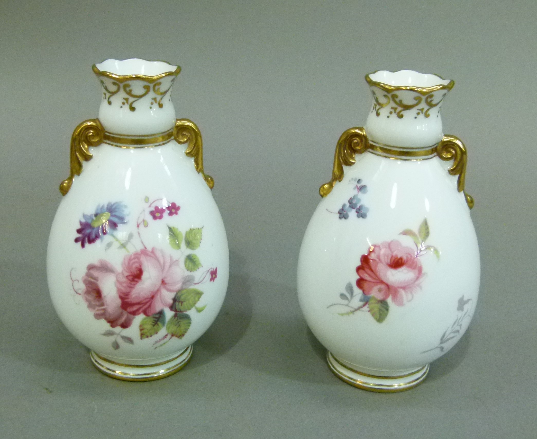 A pair of modern Swansea bone china ovoid vases, 10cm high