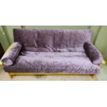 A slatted sofa bed with purple dralon covered cushions, 200cm wide