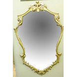 A gilt frame shield shaped wall mirror