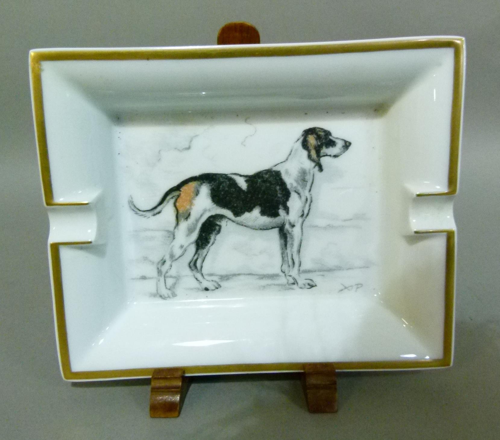 A Hermes china ashtray printed with a hound, gilt rim line, 19cm x 15.5cm