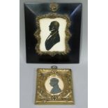 An 19th century silhouette of a gentleman in a ebonised frame with gilt metal mounts, 19cm x 16.5cm,