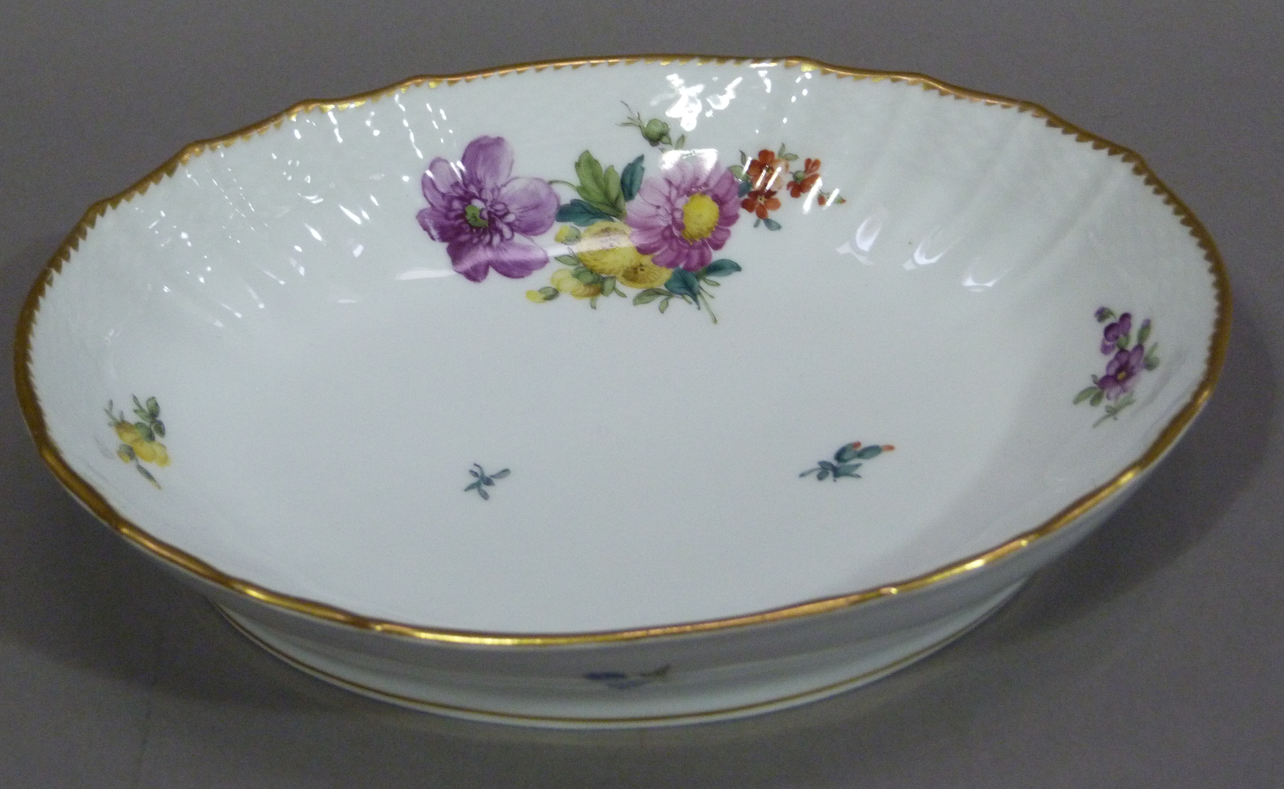 A Royal Copenhagen porcelain oval dish with floral decoration, 21.5cm wide