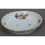 A Royal Copenhagen porcelain oval dish with floral decoration, 21.5cm wide