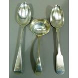 Two silver serving spoons, both initialled London 1803, maker HS and Newcastle 1838 maker TW