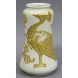 A Burmantofts vase, the pale body painted in yellow and gilt lustre with a peacock, impressed mark