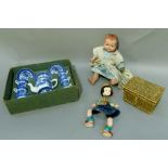 A doll's tea set in blue and white willow pattern in original box, together with a composition