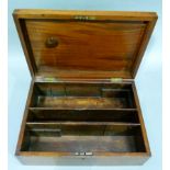An early 20th century mahogany box with brass swing carrying handles, the interior fitted with
