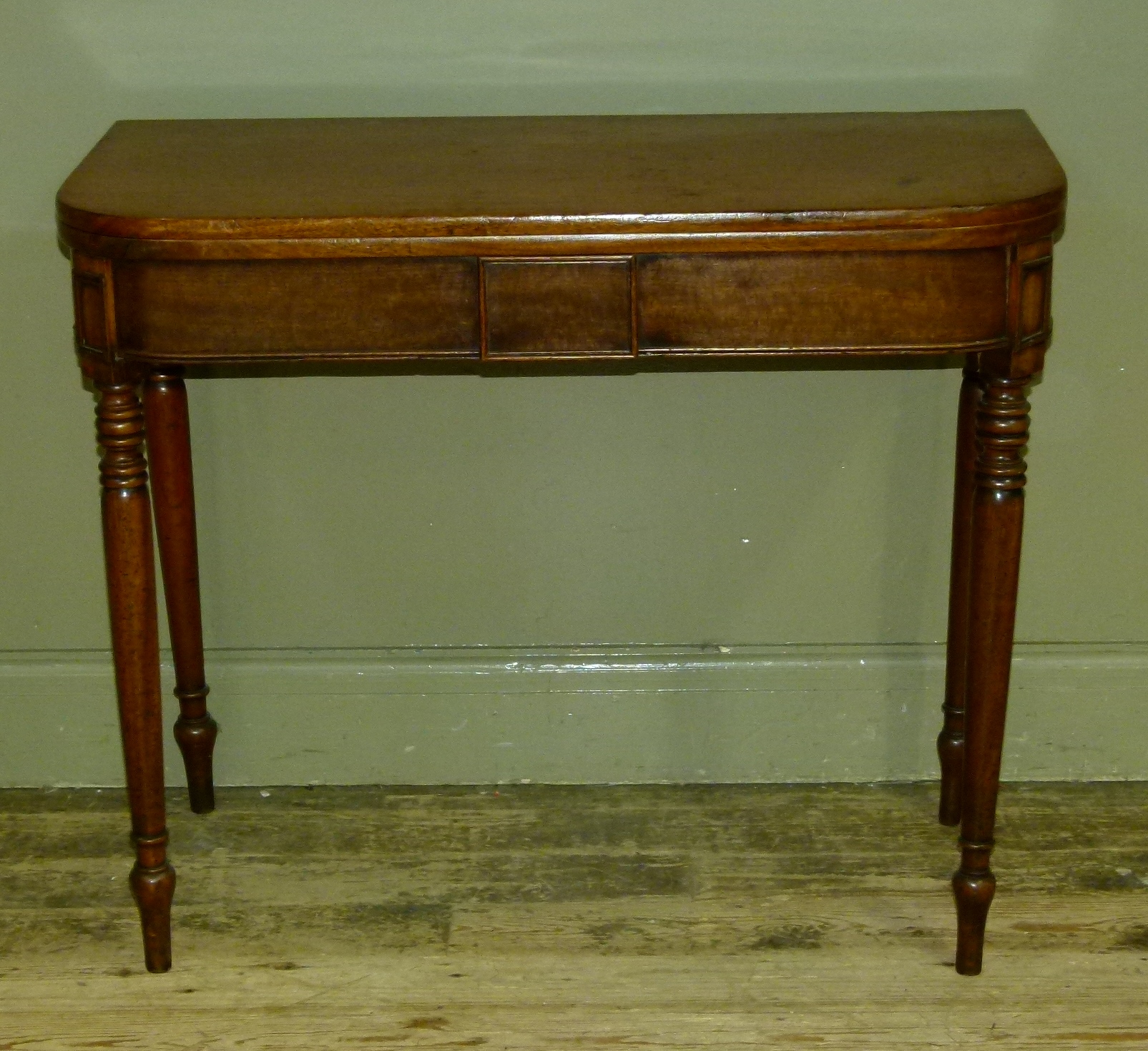 A Victorian mahogany foldover tea table with centre tablet to the frieze and on turned legs - Image 2 of 2