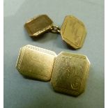 A pair of George V cufflinks in 9ct gold each octagonal face (non matching) with engraved border,