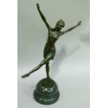 After Chiparus a reproduction bronze figure of an Art Deco dancer, on black marble base, 45cm high