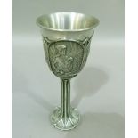 A Royal Selangore pewter tankard cast with panels depicting characters from Tolkien's Lord of The