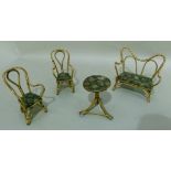 A suite of Victorian dolls cane framed furniture to include occasional sofa, two armchairs and a