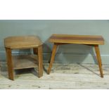 A pine occasional table on tapered and splayed legs; together with an oak two tier table with canted