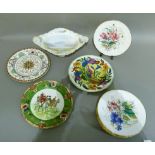A set of seven English china dessert plates each printed and enamelled with flowers gilt rim line