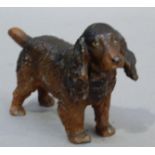 A cold painted figure of a cocker spaniel, 7.5cm high