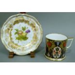 A Hamilton Derby Imari pattern mug, 7cm high and a Spode plate decorated with fruit, 16cm diameter