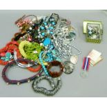 A large quantity of costume jewellery including, earrings, necklaces, beads, bangles, brooches,