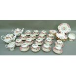 A Royal Albert Lady Carlyle tea service comprising two teapots, sixteen tea cups, sixteen saucers,