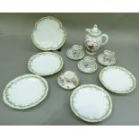 A Limoges part tea/coffee service comprising three cups and saucers, four plates and a trefoil