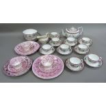 A Sunderland Lustreware part tea service with vine decoration, including a teapot, 13cm high and