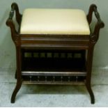 An Edward VII piano stool with upholstered hinged top and undertier with galleried rail