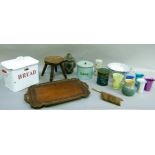 An elm stool, 23cm high, and Indian hardwood tray, a metal cake tin etc