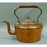 A Victorian copper kettle of oval outline, 28cm over the handle