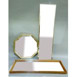 A gilt framed rectangular mirror with bevelled plate, 118cm x 32cm, another similar with wooden