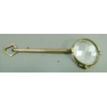 A lorgnette c.1925 the hexagonal gold plated barrel with longitudinal engine turning