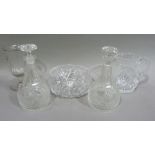 A pair of cut glass decanters and stoppers 25cm high, a bowl, a celery vase and a cut glass jug 18cm