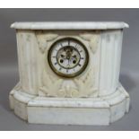 A Victorian white marble mantel clock with applied leaf decoration and white enamel dial, 41cm wide