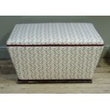A Victorian style upholstered box ottoman of tapered outline on plinth base