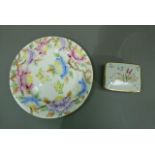 A Maling ware circular dish decorated in pastel colours with flowers, leafage and butterflies, 28.