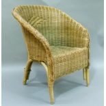 A child's wicker armchair with cushion