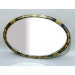 An oval bevelled wall mirror with black and gilt chinoiserie frame, 82cm x 55cm