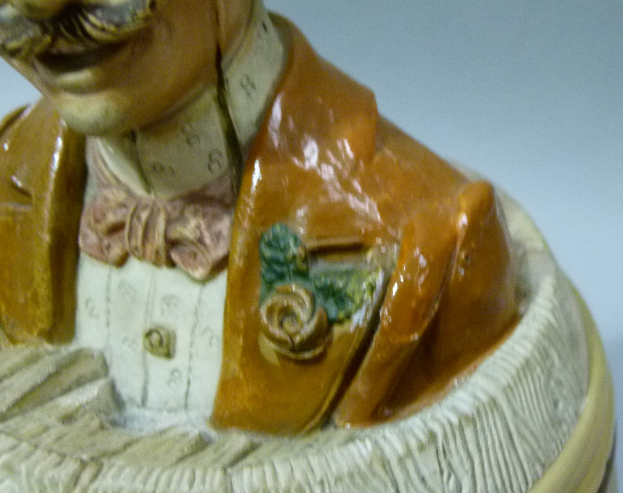 An 19th century Austrian pottery tobacco jar and cover modelled as a gentleman in elegant attire, - Image 5 of 5