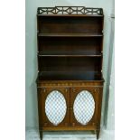 A George III style mahogany book case the shelved waterfall top with three quarter gallery pierced