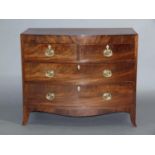 AN EARLY 19TH CENTURY FIGURED MAHOGANY CHEST of two short and two long graduated drawers, cockbeaded