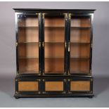 A 19TH CENTURY AESTHETIC EBONISED AND GILT DISPLAY CABINET having a moulded cornice above three