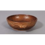 THOMPSON OF KILBURN 'MOUSEMAN', an oak circular adzed bowl with shallow foot, carved with a mouse,