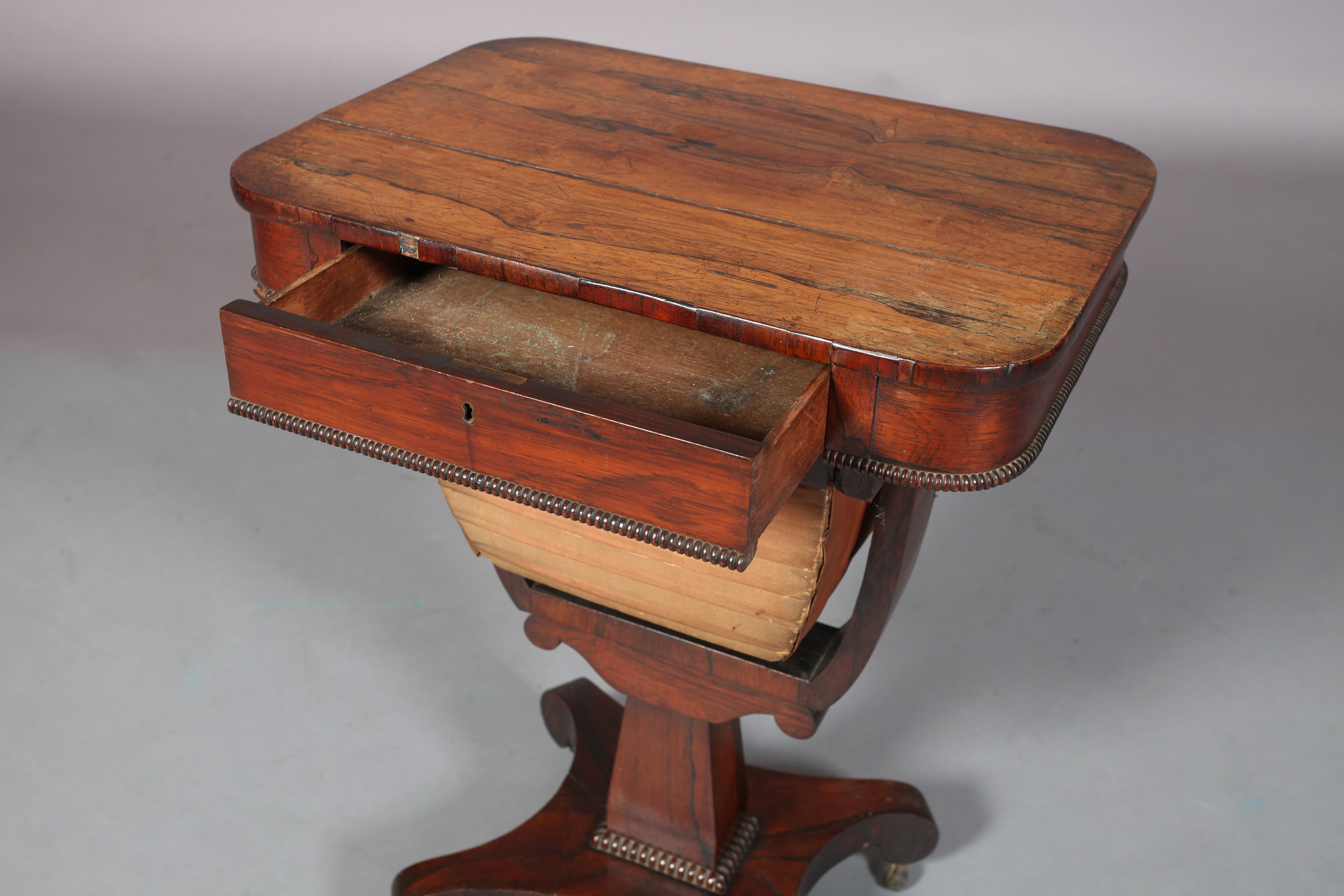 A WILLIAM IV ROSEWOOD VENEERED WORK TABLE, the rounded rectangular top fitted with frieze drawer and - Image 3 of 3