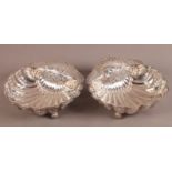 A PAIR OF EDWARD VII SILVER BASKETS, Sheffield 1902, Atkin Bros, of shell form, the fluted bowl
